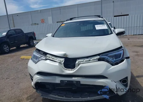 2017 Toyota Rav4 Limited z USA, uszkodzony, nr VIN JTMYFREV0HJ721547